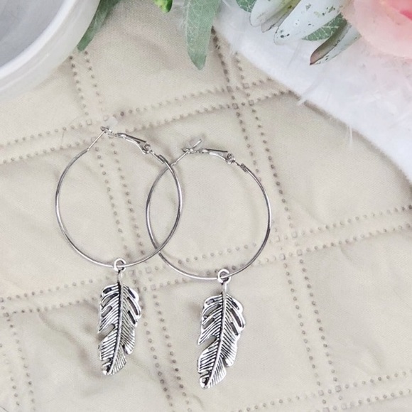 Jewelry - NWT Silver Hoop Feather Drop Earrings